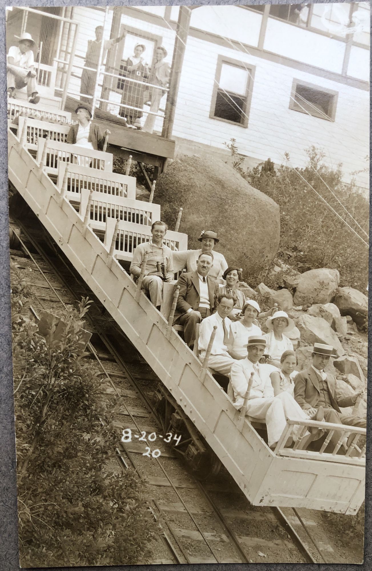 1934 Real Photo Postcard of people riding on a funicular - incline