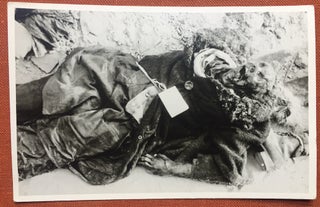 Item #H1133 Real photo postcard of a victim of bombing in WWII, a tagged victim of bombing,...