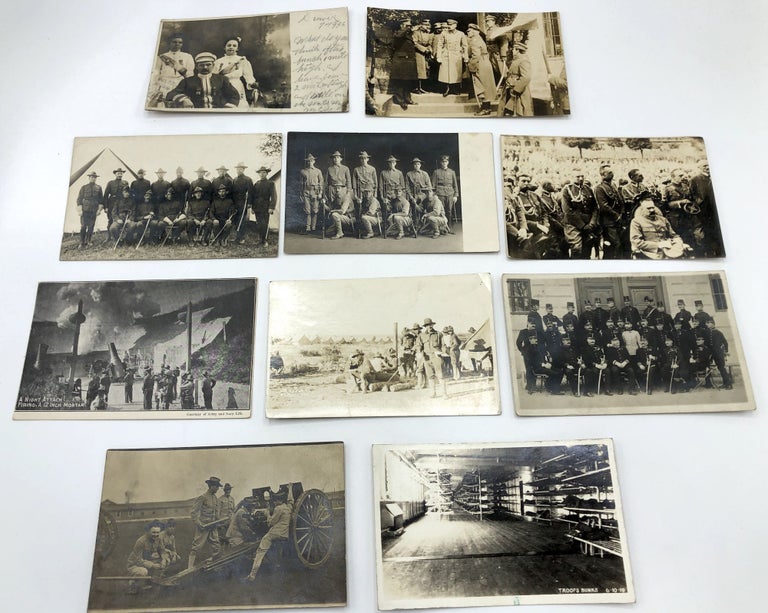 Item #H15152 10 military postcards mainly Real Photo, WWI & before, European & American, including Denver 1906 officer & nurses (?), RPPC of generals, 1909 RPPC regiment in Buffalo, Co. C Squad "Indoor Contest" with names on rear, 12 inch mortar night attack, RPPC from Battalion "B" 1st PA, heading for New Mexico, RPPC of of guys handling a big gun on wheels, 1919 RPPC of troop bunks
