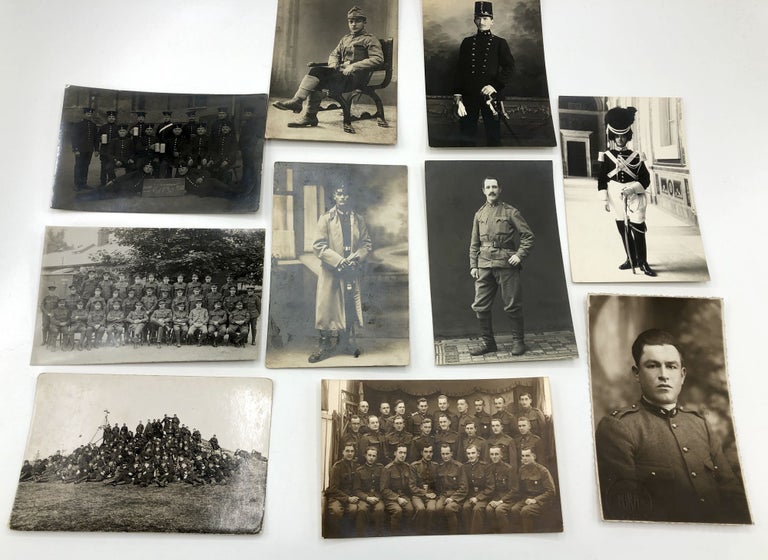Item #H15153 10 military postcards, mainly Real Photo, WWI & before, European & American, battalions, officers: R. A. M. C. (New Army) Record Office Staff; Polish officer; Sitting young officer, note in Slavic (we think), RPPC of an officer, Sarajevo; Officer in full military regalia, Rome; Portrait of an Italian officer, signed on the back Frederici Defrancesco; Battalion outside on a hill (Czech), 1913 RPPC of a German gunnery battalion