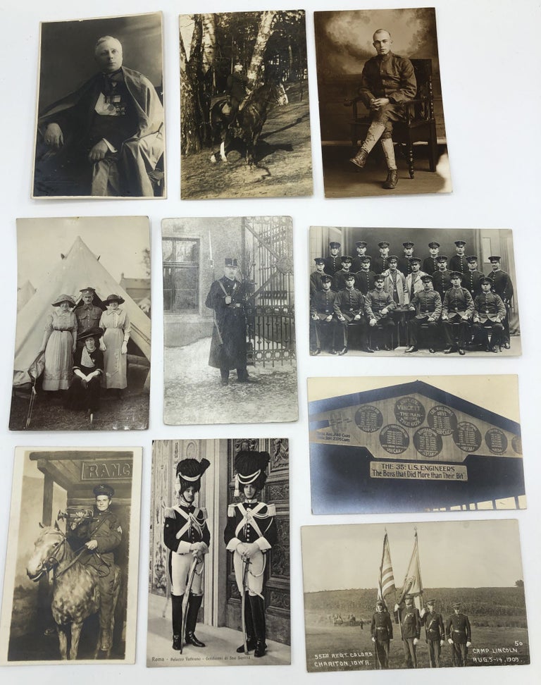 Item #H15154 10 military postcards, mainly Real Photo, WWI & before, European & American: Photo from Pittsburgh of officer on horse with trumpet; 2 Vatican guards; 1909 RPPC 55th Reg. Colors, Chariton IA at Camp Lincoln; Side of a roof of 35th US Engineers; RPPC of officer & 3 ladies outside a tent; RPPC of an officer in Prague; RPPC of unidentified officer with handsome cleft chin; officer on horse Stockholm 1910; RPPC of a battalion from Stuttgart; RPPC of unidentified French general