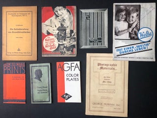 Group of 37 German and American photography brochures, pamphlets, catalogs, instruction manuals, etc. for camera, lenses, film and darkroom products, 1910s-1930s, plus large handful of leaflets, flyers, brochures and advertising
