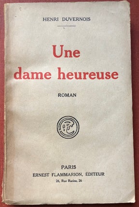 Item #H4132 Une dame heureuse, roman - INSCRIBED BY AUTHOR. Henri Duvernois