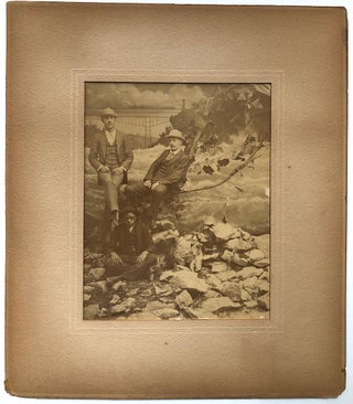 Item #H6560 Ca. 1890 photo of two gentlemen and an African-American young man next to a roaring...