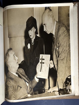 1939 Bound volume of 75 original 13x11 photos of newsworthy pictures, each with a bound in caption sheet: much on domestic events: sports, WPA, fire, famine, sports, disasters, WWII in Europe, royals, famous people, world events