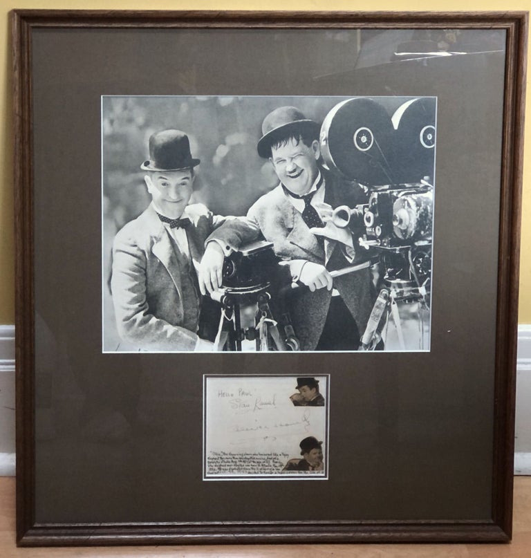 Item #H18261 Autographs of Laurel and Hardy in 1940, matted and framed with photo. Stan Laurel, Oliver Hardy.