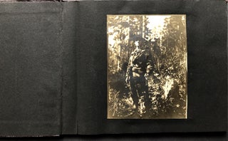 Item #H25287 Small ca. 1910 photo album of a hunting trip, possibly Montana: fishing, black...