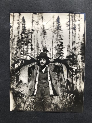 Small ca. 1910 photo album of a hunting trip, possibly Montana: fishing, black bears, elk, etc.