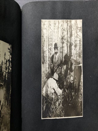 Small ca. 1910 photo album of a hunting trip, possibly Montana: fishing, black bears, elk, etc.