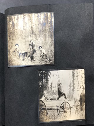 Small ca. 1910 photo album of a hunting trip, possibly Montana: fishing, black bears, elk, etc.