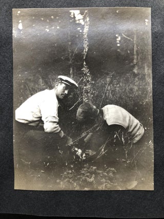 Small ca. 1910 photo album of a hunting trip, possibly Montana: fishing, black bears, elk, etc.