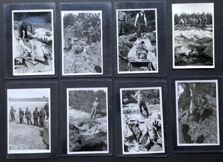 18 ca. 1944 original photos of American infantry exhuming bodies from a mass grave left by the Germans