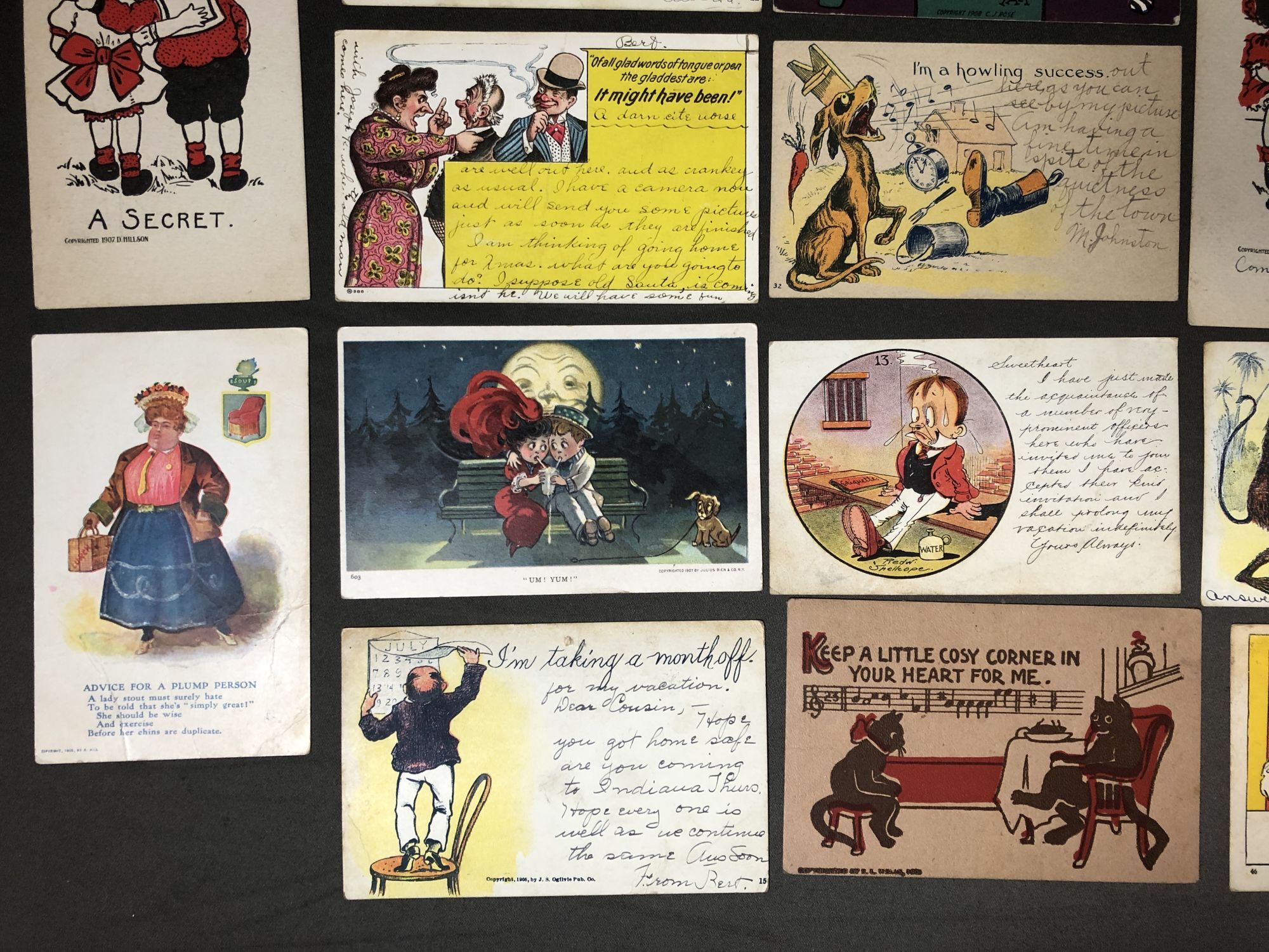 Group of 18 humorous early 1900s postcards featuring cartoons