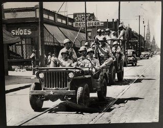 Item #H33647 14 x 11" photo of WWII soldiers on Mack Ave. in Detroit in Jeep. Charles "Teenie"...