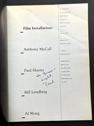 Film installations: Anthony McCall, Paul Sharits, Bill Lundberg, Al Wong, inscribed by Sharits (1987)