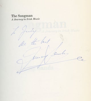 Item #z014892 The Songman: A Journey in Irish Music, Inscribed by Tommy Sands. Tommy Sands
